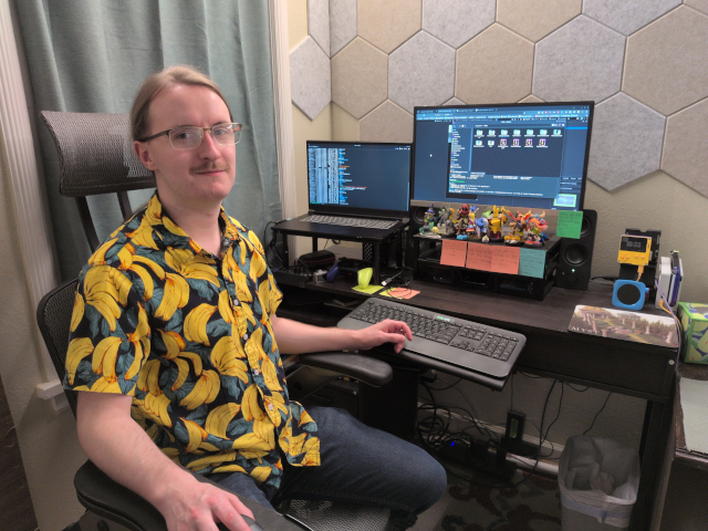Picture of Jonathan at his computer.